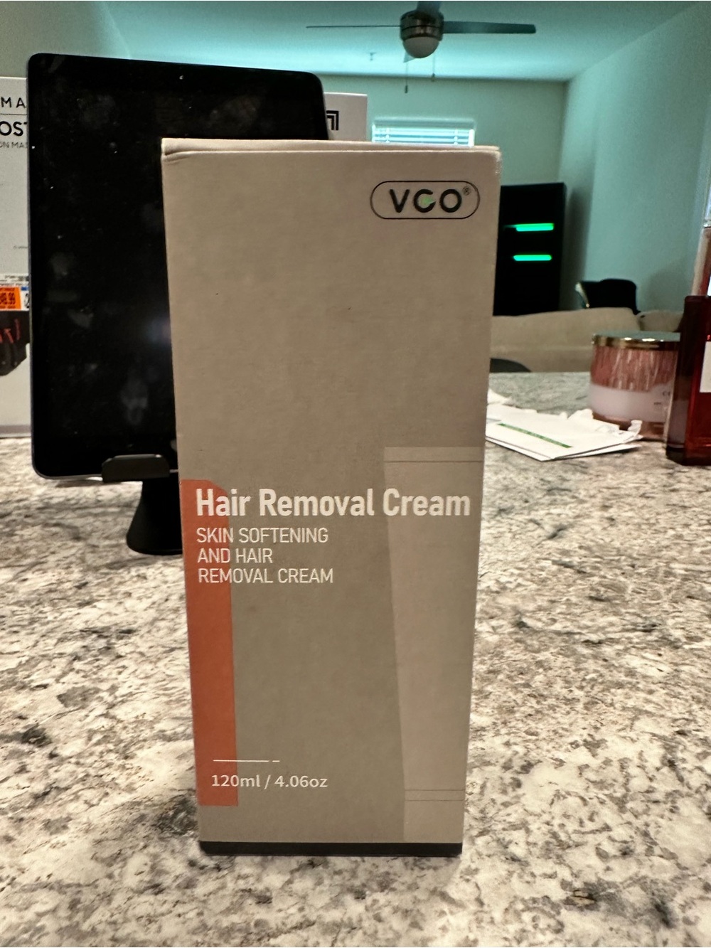 CO Hair Removal Cream in Beige and Orange Accents